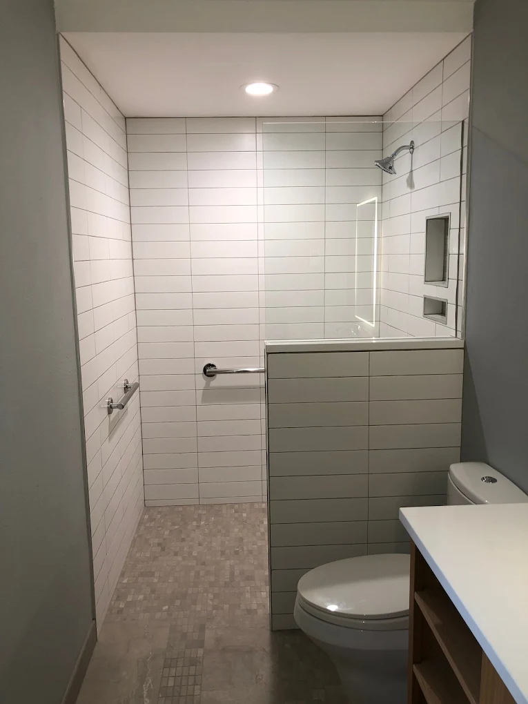 White subway-tile walk-in shower