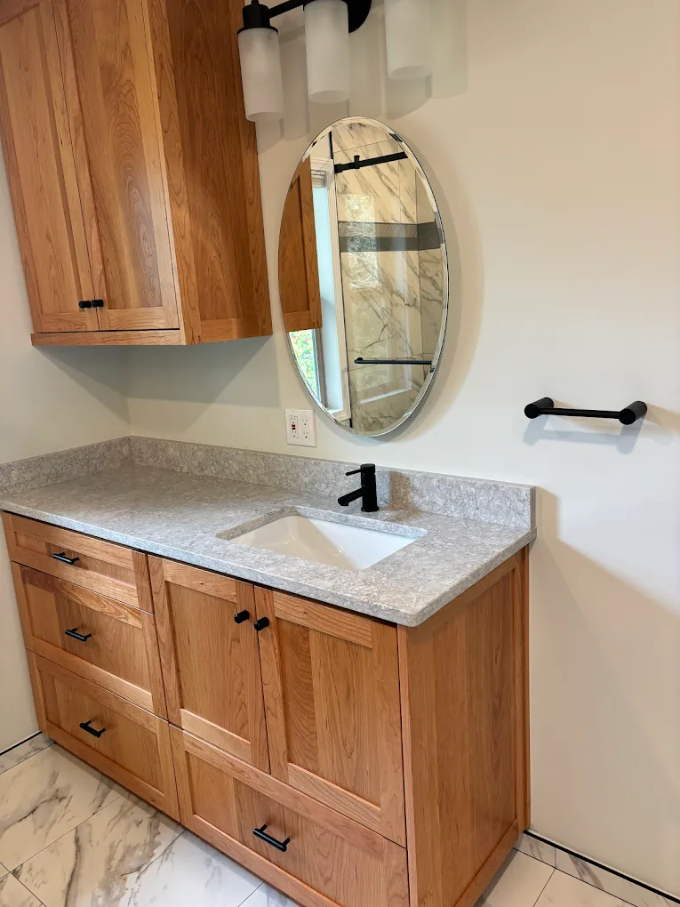 Wood vanity bath with hex floor