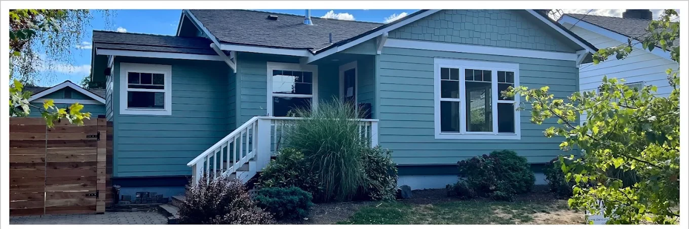 Restored ranch exterior with refurbished trim