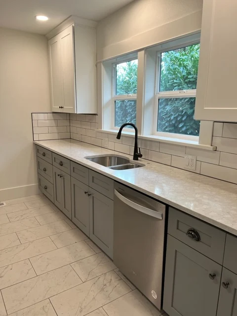 Galley kitchen with subway tile